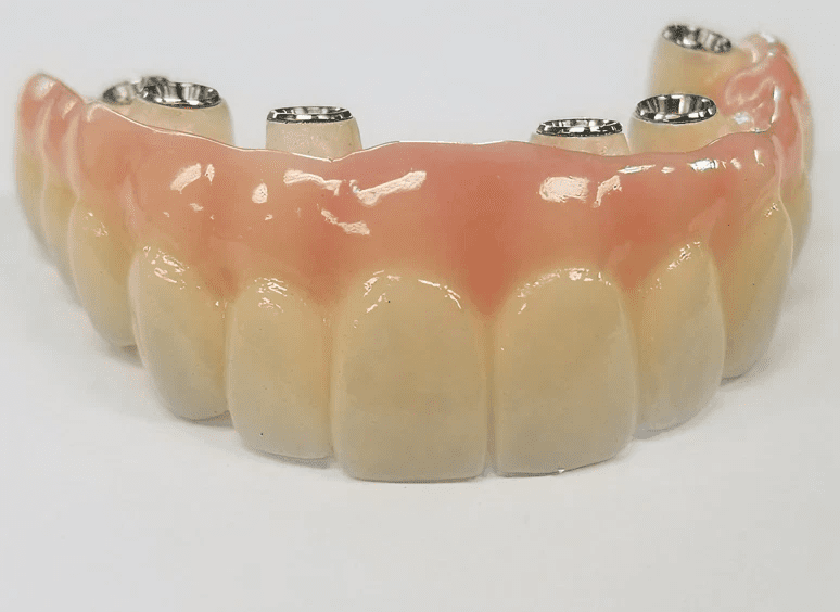 Artificial teeth with gum base