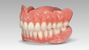Full set of upper and lower dentures